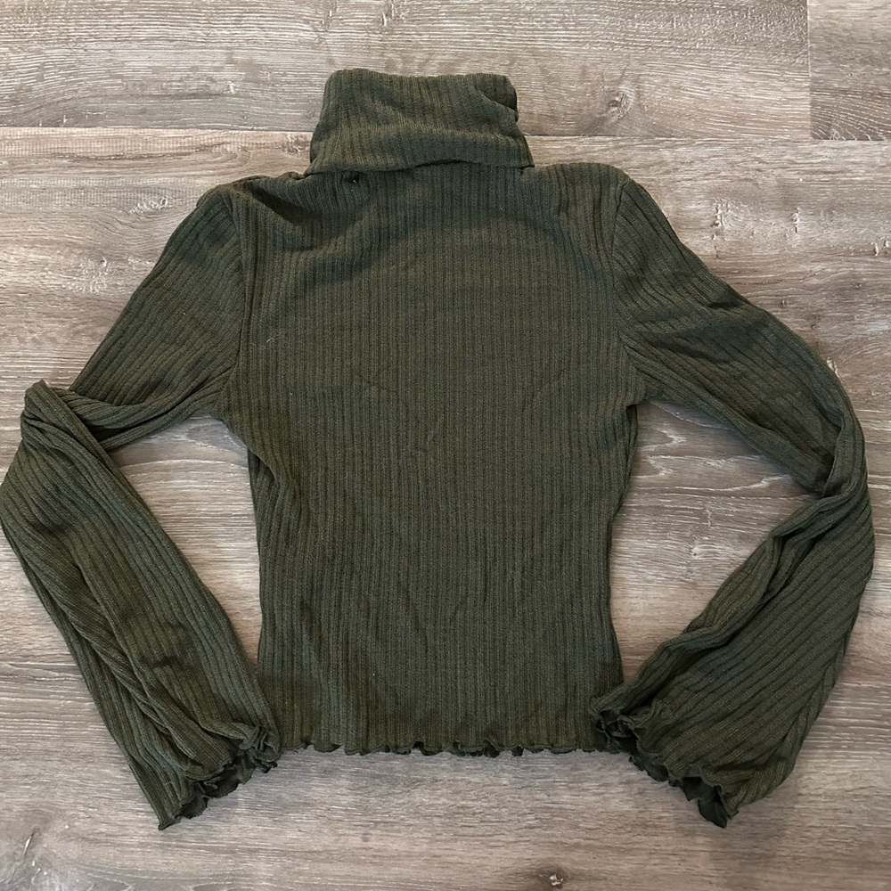 Green turtleneck